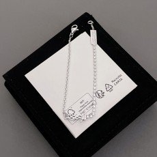 입생로랑 YSL 반 체인 반 큐빅 팔찌